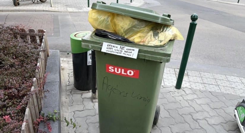 A társasházakon is múlik, hogy mekkora a budapesti szeméthegy: 10-12 órákat állnak az utcán, szabálytalanul – a belvárosban biztos nem fogja ingyen húzogatni a kukákat a Mohu