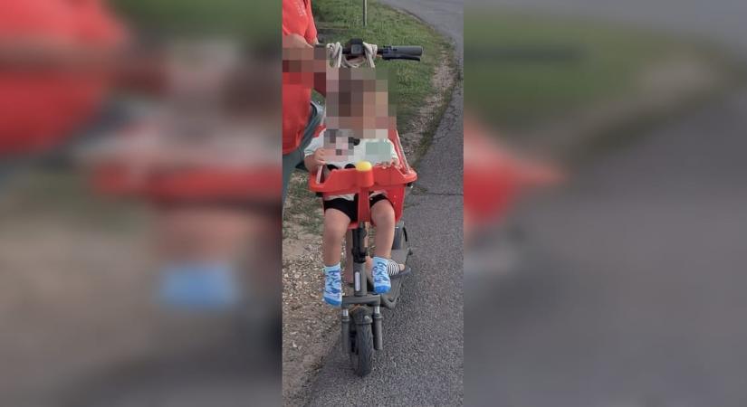 „Sok mindent láttunk már, de ez tényleg hajmeresztő” – rollerre szerelt hintában szállította kisgyerekét egy férfi